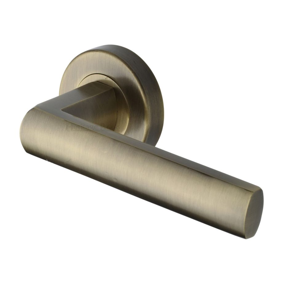 Heritage Brass - Poseidon Door Handle on Round Rose