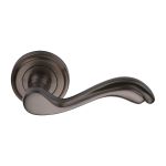 Heritage Brass - Lisboa Door Handle on Round Rose