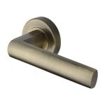 Heritage Brass - Poseidon Door Handle on Round Rose
