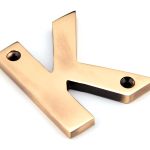 From The Anvil Polished Bronze Letter