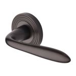 Heritage Brass - Sutton Reeded Door Handle on Round Rose