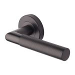 Heritage Brass - Bauhaus Mitre Knurled Door Handle on Round Rose