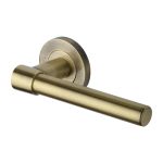 Heritage Brass - Phoenix Door Handle on Round Rose