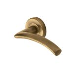 Heritage Brass - Centaur Door Handle on Round Rose