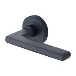 Heritage Brass - Trident Door Handle on Round Rose