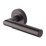 Heritage Brass - Bauhaus Mitre Knurled Door Handle on Round Rose