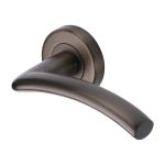 Heritage Brass - Centaur Door Handle on Round Rose