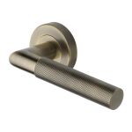 Heritage Brass - Bauhaus Mitre Knurled Door Handle on Round Rose