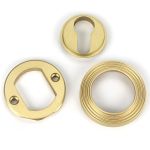 Satin Brass Round Euro Escutcheon (Beehive)