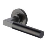 Heritage Brass - Spectral Door Handle on Round Rose
