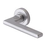 Heritage Brass - Trident Door Handle on Round Rose