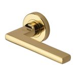 Heritage Brass - Trident Door Handle on Round Rose