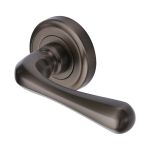 Heritage Brass - Charlbury Door Handle on Round Rose